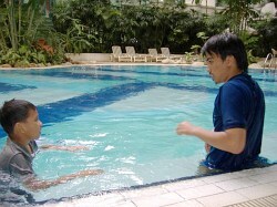swimming lesson teacher student